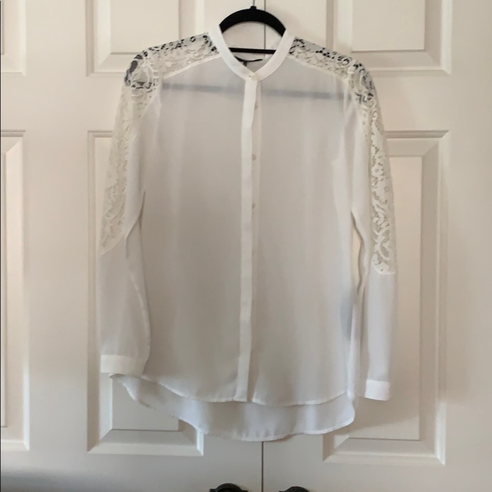 White blouse with lace.